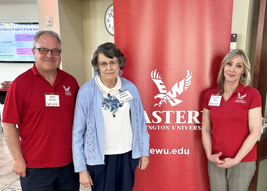 Claire Schneck with EWU's Jason Durfee and Courtney Gray.