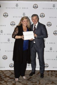 Jody Graves Receiving Steinway Teachers Hall of Fame Award