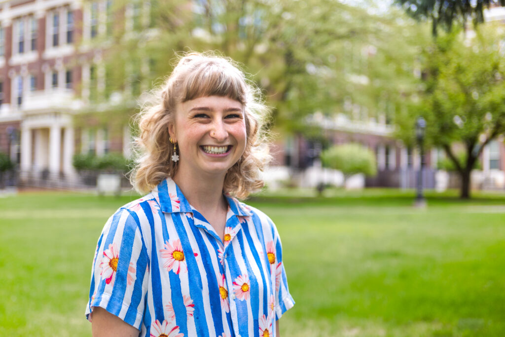 EWU art major Skylar Miller standing in front of Showalter Hall