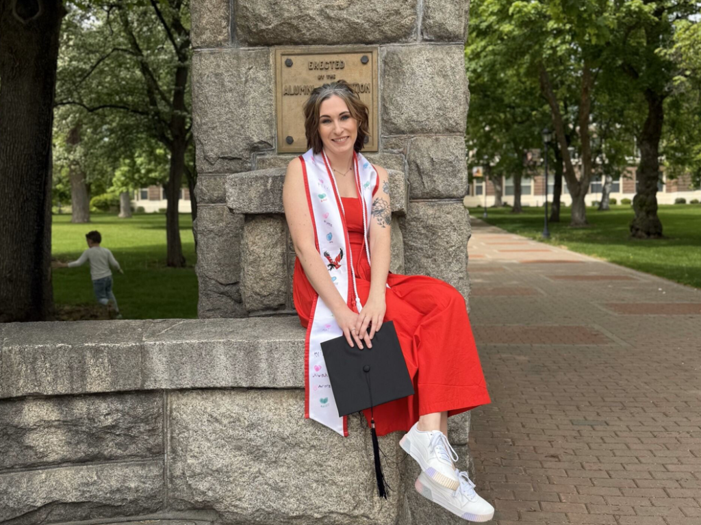 Portrait of Jessica in front of showalter hall