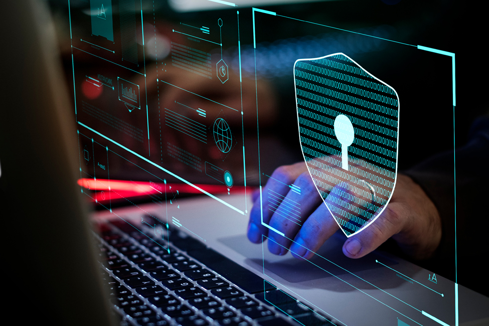 Photo of hand on a keyboard with a cyber background.