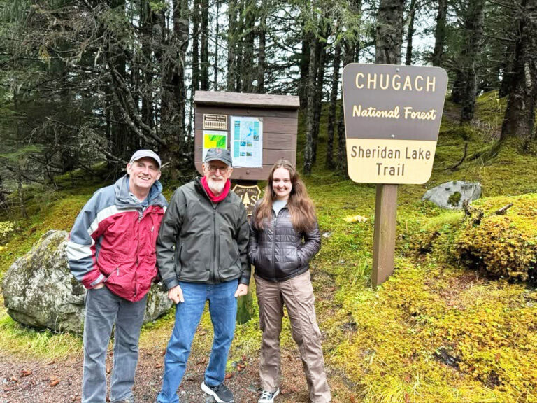 Bill Youngs pictured at a National Park with two graduate students.