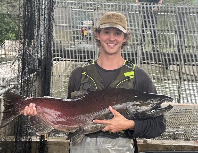 EWU student Sam Caruso holds a Westslope Cutthroat Trout